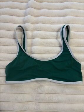 Athleta green bra with white piping size small